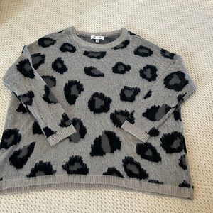 Black and gray one size cheetah sweater. Super soft and cozy!